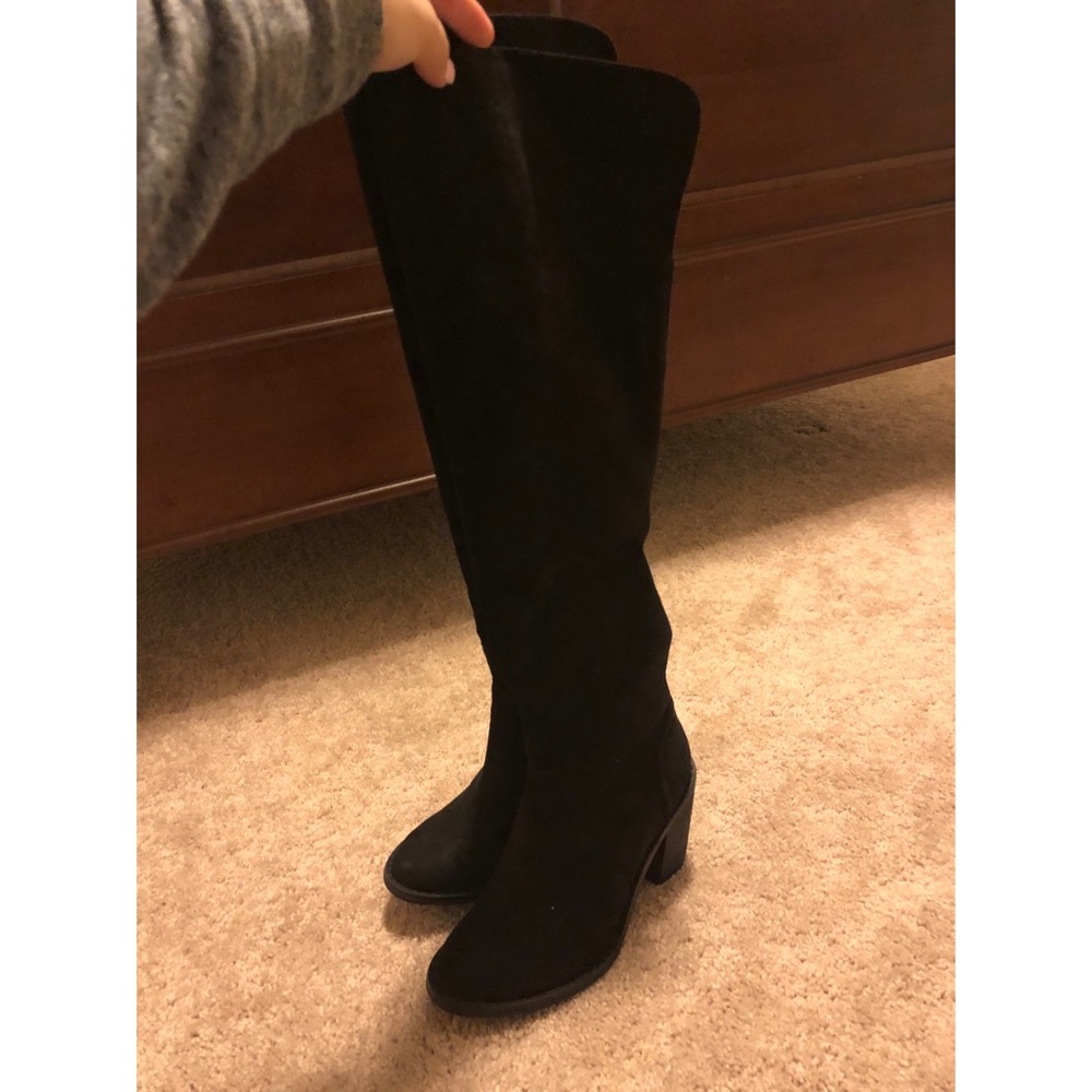 Tall black boots